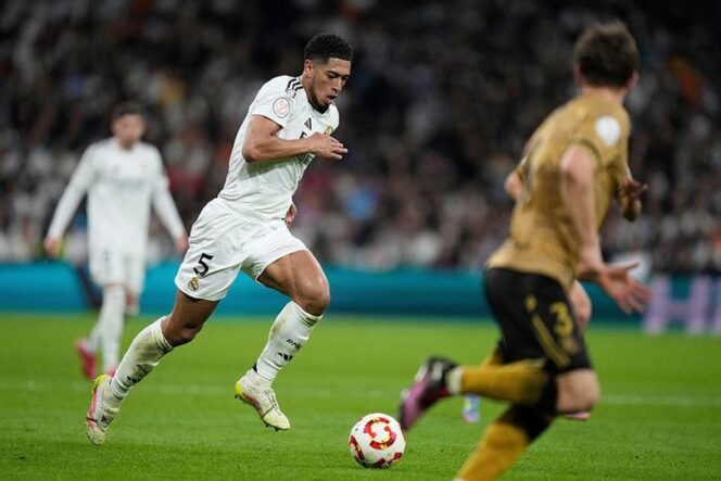 
Aksi Jude Bellingham di laga Real Madrid vs Real Sociedad, semifinal Copa del Rey 2024/2025 (c) AP Photo/Bernat Armangue